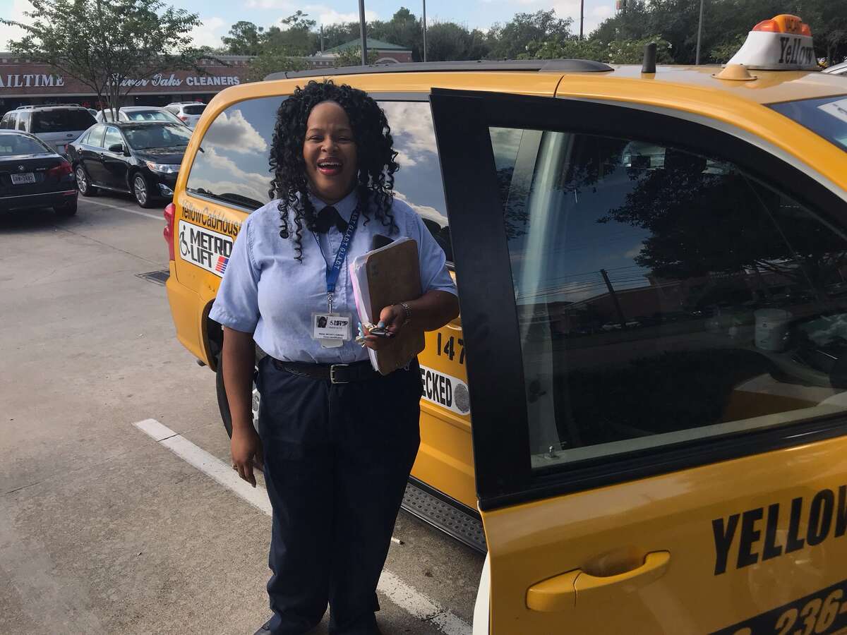 Ramonia McCarty smiles on Oct. 5 as she recounts spending 18 hours stranded near Hillcroft and Interstate 69 with a MetroLift passenger in her minivan during the storm that pounded Houston on Aug. 26 and 27.