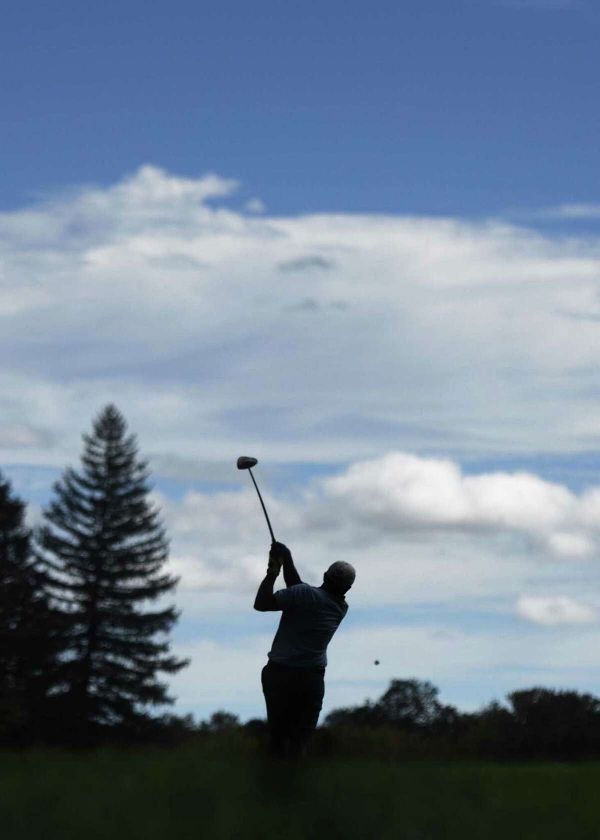Former New York Jets running back Bruce Harper tees off at the 27th annual Tim Teufel Celebrity Golf Tournament at Tamarack Country Club in Greenwich, Conn. Tuesday, Oct. 10, 2017. The golf outing, presented by Sweet'N Low, featured more than a dozen former and current sports celebrities competing on the course to raise money for the Fairfield County Sports Commission.