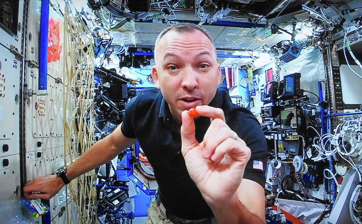 Astronaut Randy Bresnik demonstrates floating around the International Space Station from a live webcast from space. ﻿