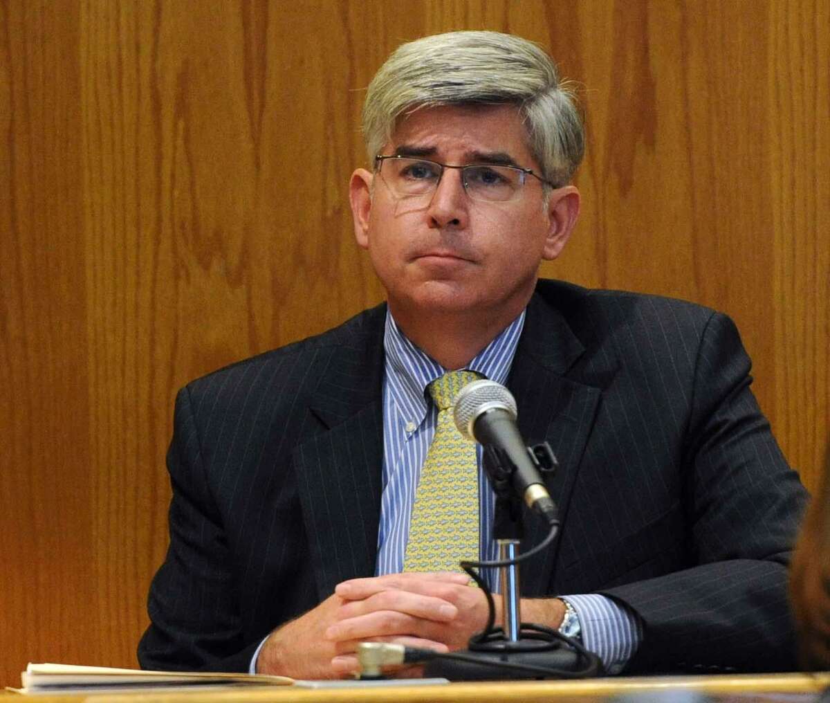 Chief Medical Examiner James Gill in Superior Court in Bridgeport, Conn. in 2014. The Office of the Chief Medical Examiner in Connecticut has been granted provisional accreditation by the National Association of Medical Examiners. However, if the state medical examiner’s office doesn’t address its staffing shortage within the next 12 months, its accreditation will be yanked.
