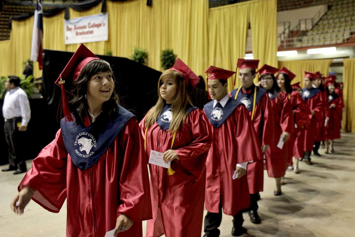 Students graduate from Travis Early College High School in 2012. Its partnership with San Antonio College is closing the education gaps for Hispanic students.