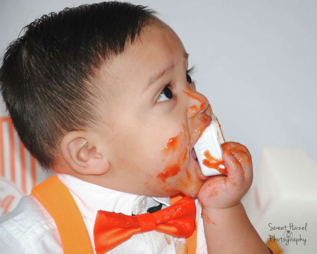 Miguel Macias, who turns 1 in November, doesn't need a smash cake. He had a nice Whataburger meal instead in his photo shoot by Sweet Hazel Photography.