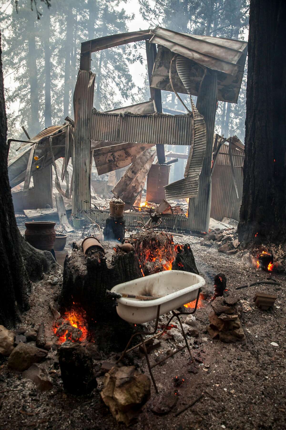 Burned out and collapsed house along Mt Veeder Rd after flames from the Nuns fire moved through the Mt Veeder area in Napa, California, USA 11 Oct 2017.