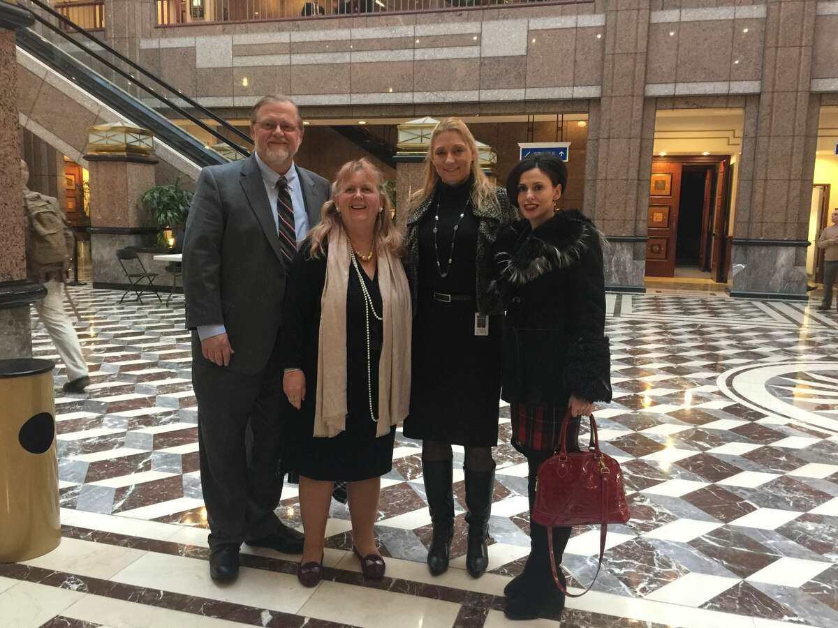 From left to right: Dr. Matthew Blondin, Audrey Blondin, State Representative Michelle Cook, Fraidy Reiss, founder and leader of Unchained At Last, at a public hearing in Hartford to discuss a minimum marriage age in Connecticut on March 6, 2017. The bill was signed into law on June 20, 2017. 