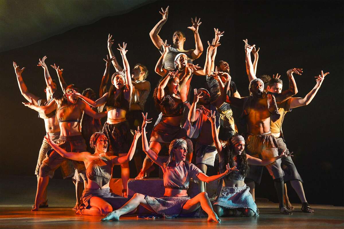 Members of the cast evoke the sacred burning bush in TheatreWorks' "The Prince of Egypt."