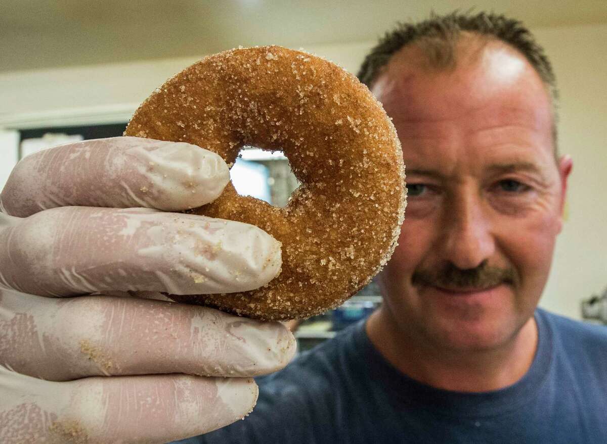 Richard Pearce makes cider doughnuts at the Lakeside Farms Tuesday Oct. 10, 2017 in Ballston Lake N.Y. (Skip Dickstein/Times Union)