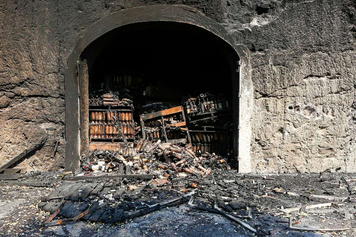 Hundreds of wine bottles are damaged and burned from inside the cellar at White Rock Vineyards in Napa, California on October 12, 2017