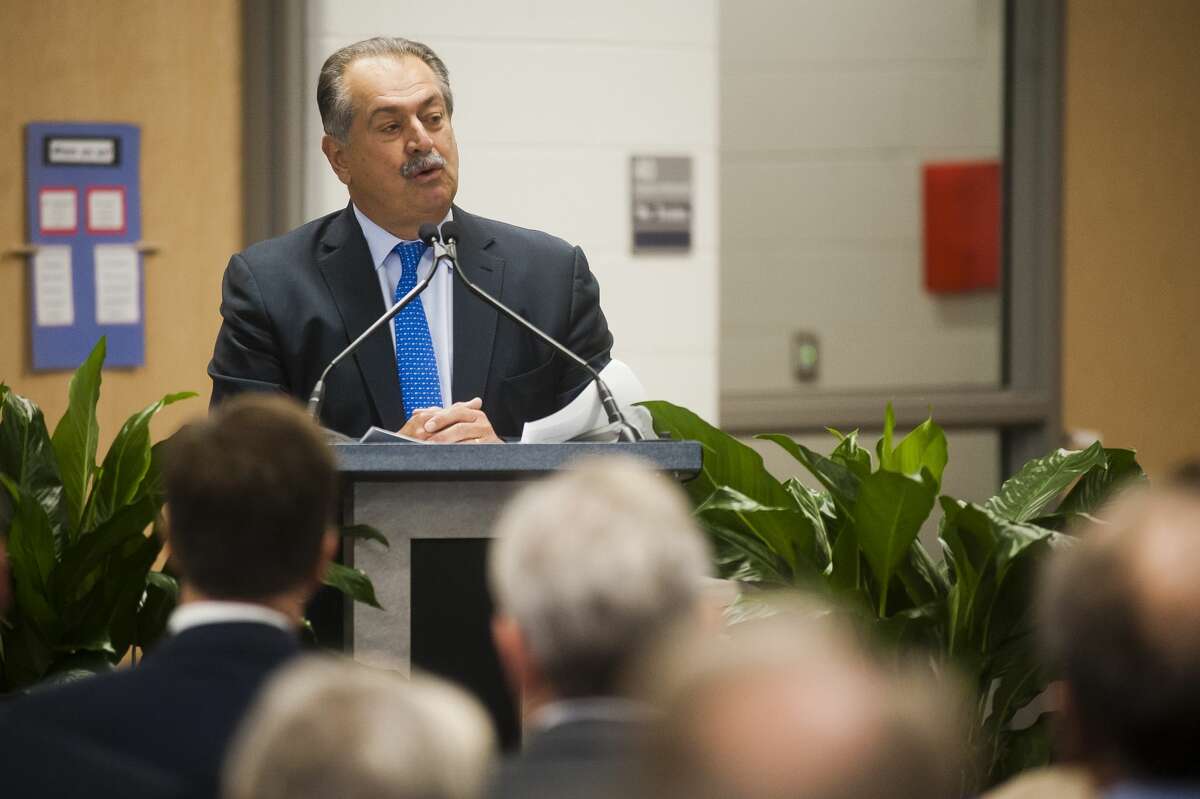 Dow Chemical Company CEO Andrew Liveris speaks during an open house event for Central Park Elementary, a new STEM school, on Friday, Oct. 12, 2017 in Midland. (Katy Kildee/kkildee@mdn.net)