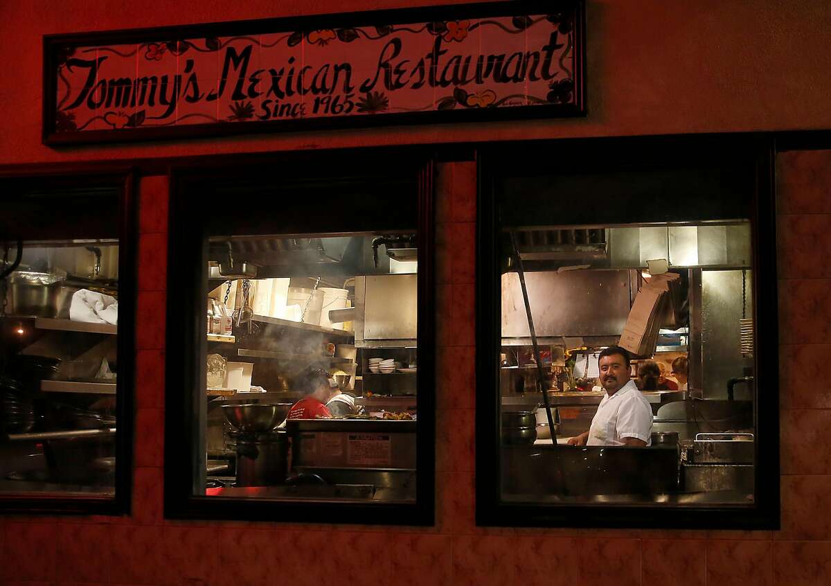 Longtime chef Rafael Granados cooks in the kitchen at Tommy's Mexican restaurant on Friday, September 29, 2017, in San Francisco, Calif.