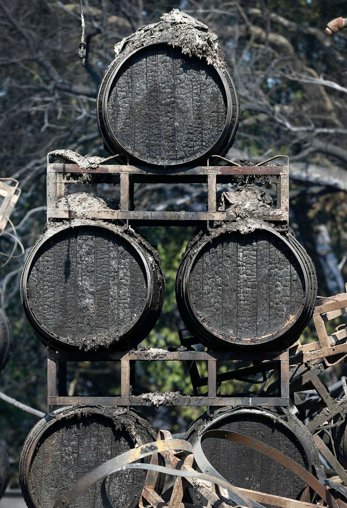 Wine barrels are charred at the Paradise Ridge Winery in Santa Rosa, Calif. on Thursday Oct. 12, 2017 after the Tubbs Fire destroyed the property but spared the vineyards.