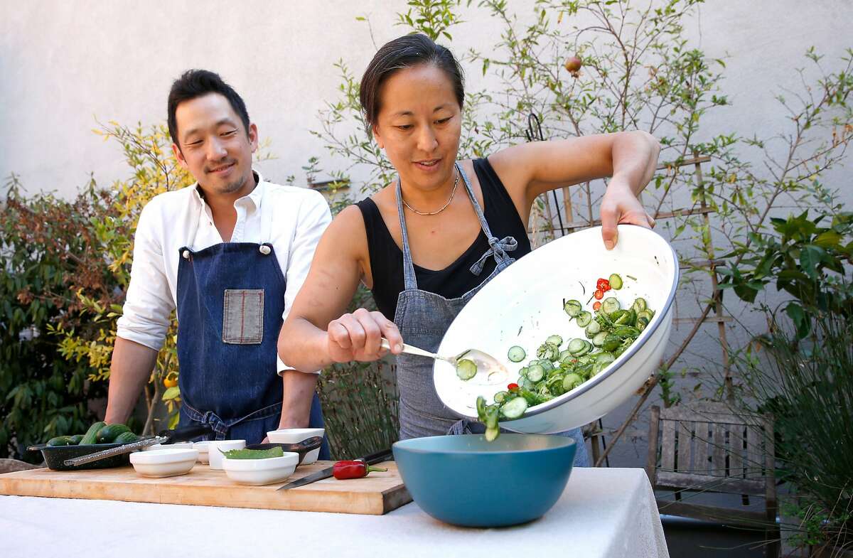 Chefs Steve Joo and Julya Shin, are the owners of a Korean ssam pop-up called Nokni, as seen on Mon. Sept.. 25, 2017, in Oakland, Ca. The chefs prepare dishes for a ssam party.