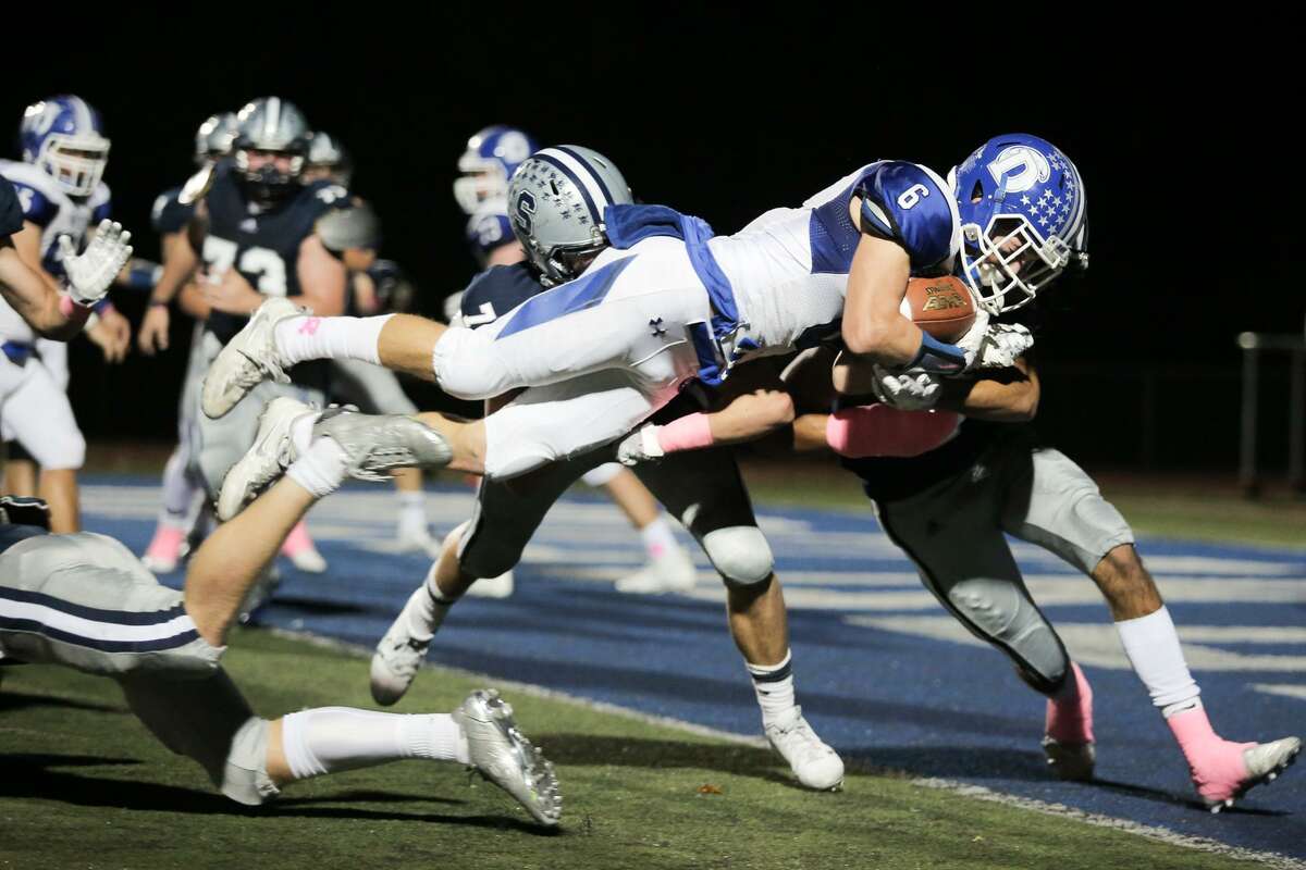 Darien's Brian Minicus attempts to dive into the endzone, just coming up short, during their game at Staples High School in Westport, Conn. on Friday, October 13, 2017.