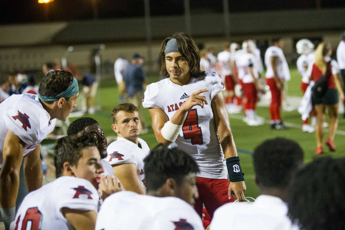 Atascocita QB Jack Roe (4) talking to the offensive line during the second half of action between North Shore vs Atascocita high school football game at Galena Park ISD Stadium, Friday, Oct. 13, 2017, in Houston. Atascocita defeated North 38-21. ( Juan DeLeon/for the Houston Chronicle )
