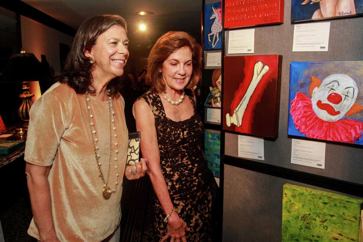 Art League Houston patrons toast Lynn Goode and Trenton