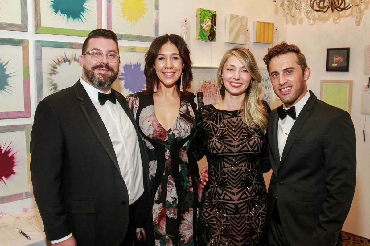 Art League Houston patrons toast Lynn Goode and Trenton