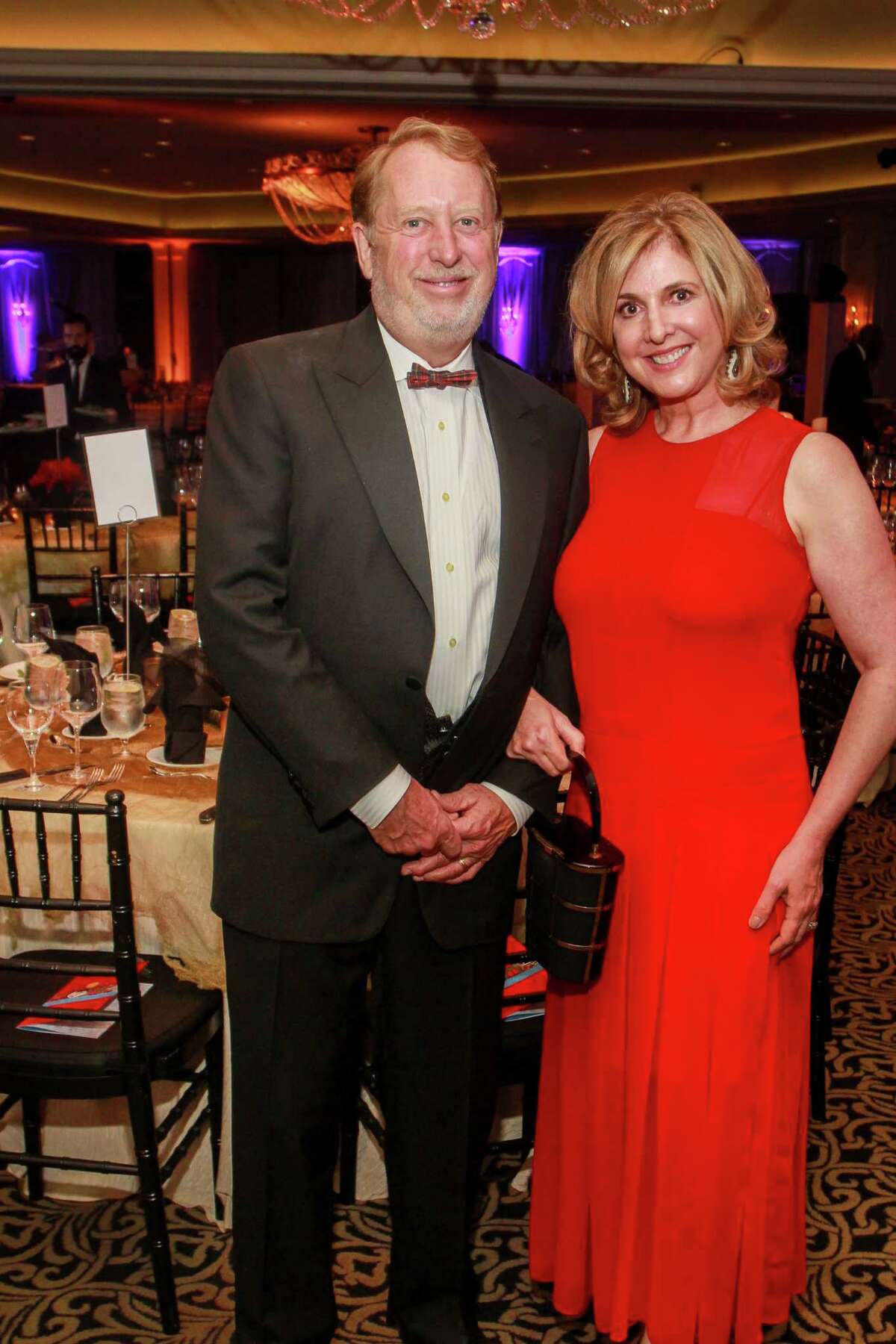 Art League Houston patrons toast Lynn Goode and Trenton
