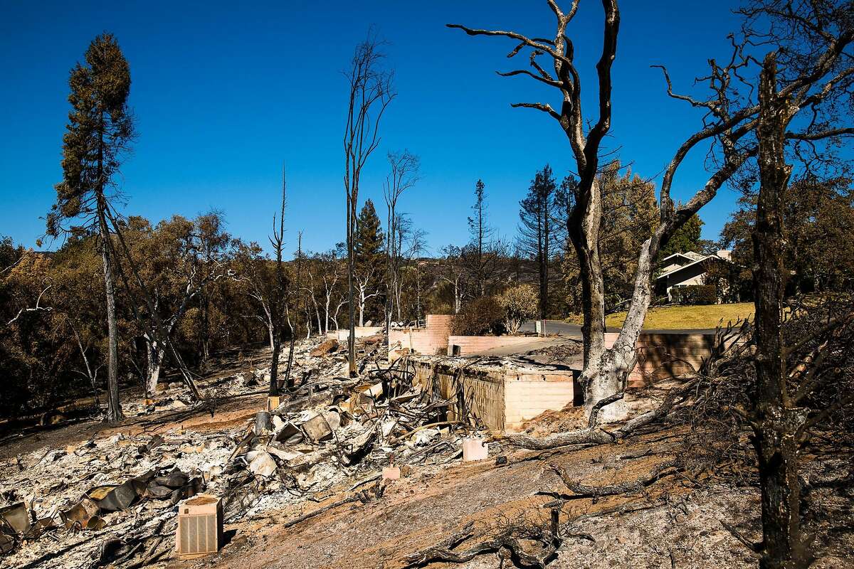 Houses on Deer Hollow Drive are seen destroyed in Napa, Calif. Saturday, October 14, 2017.