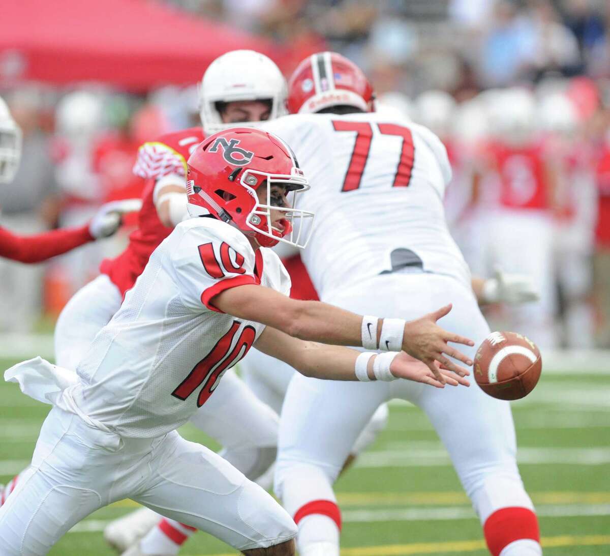 Greenwich football team beats rival New Canaan