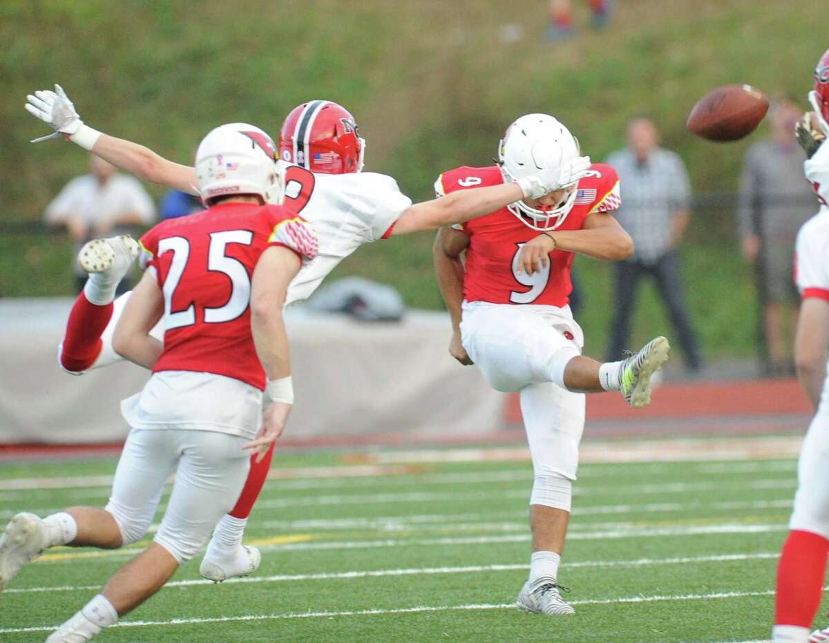 Greenwich football team beats rival New Canaan