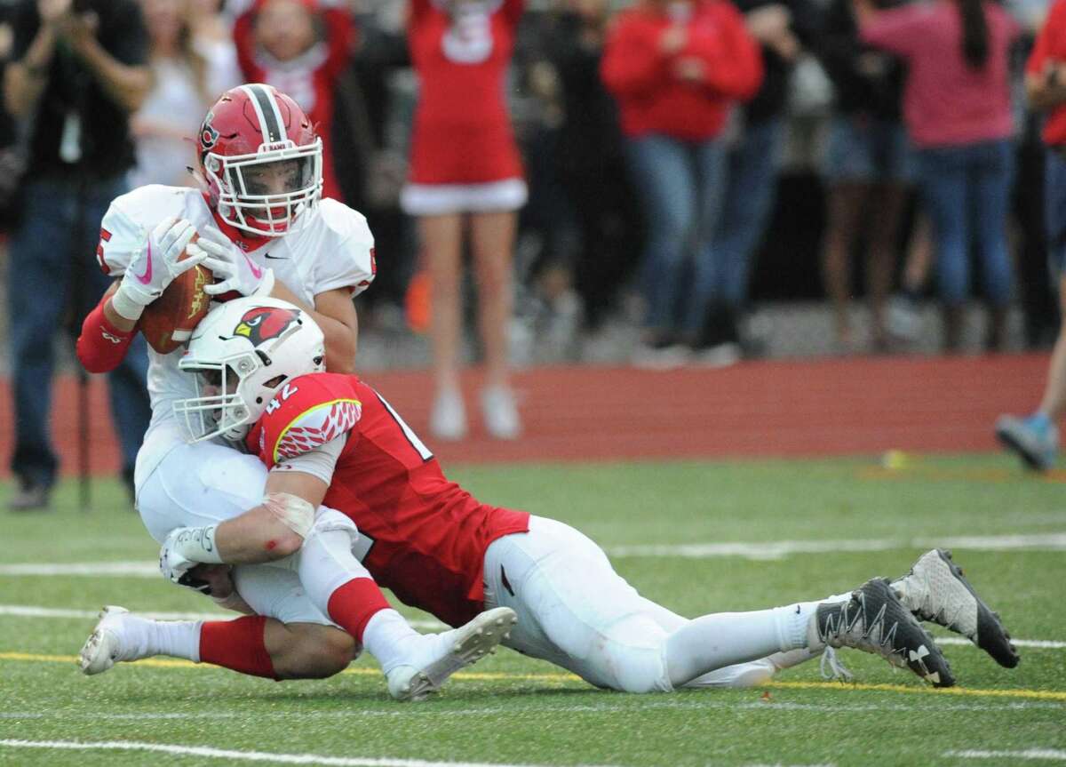 Greenwich football team beats rival New Canaan