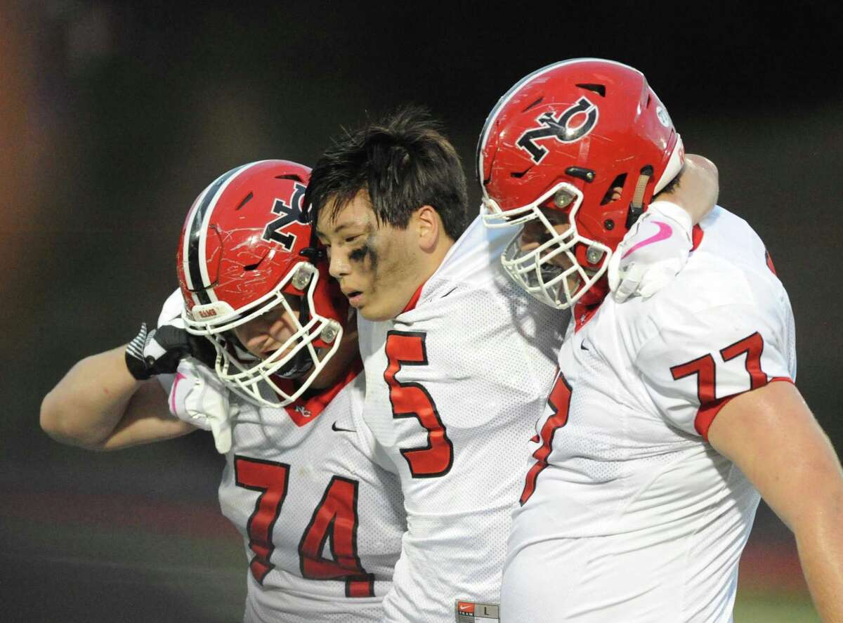 Greenwich football team beats rival New Canaan