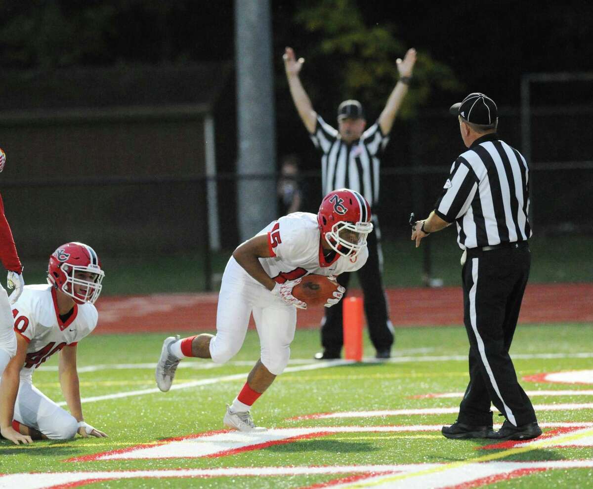 Greenwich football team beats rival New Canaan