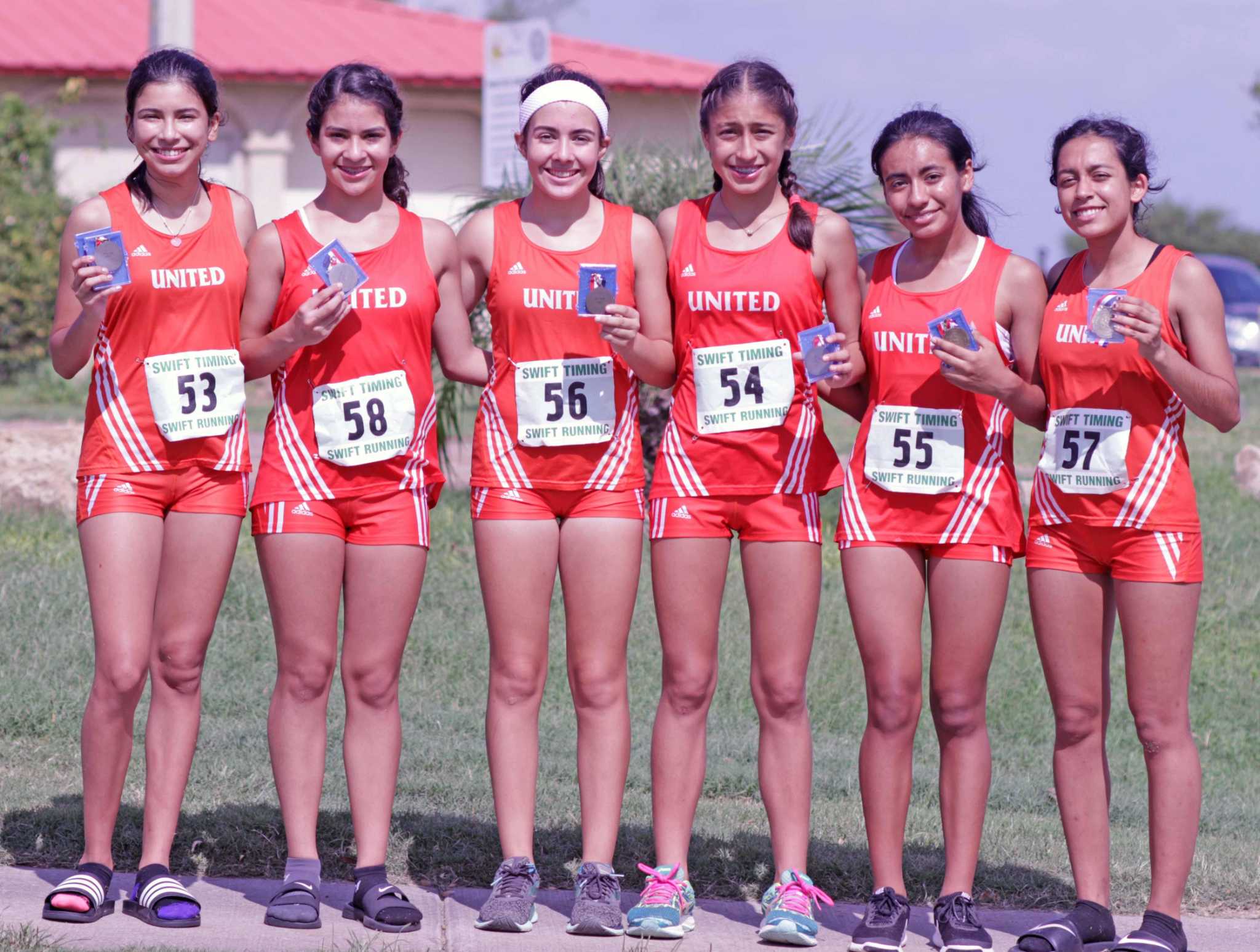 Longhorns cross country teams advance to regional meet