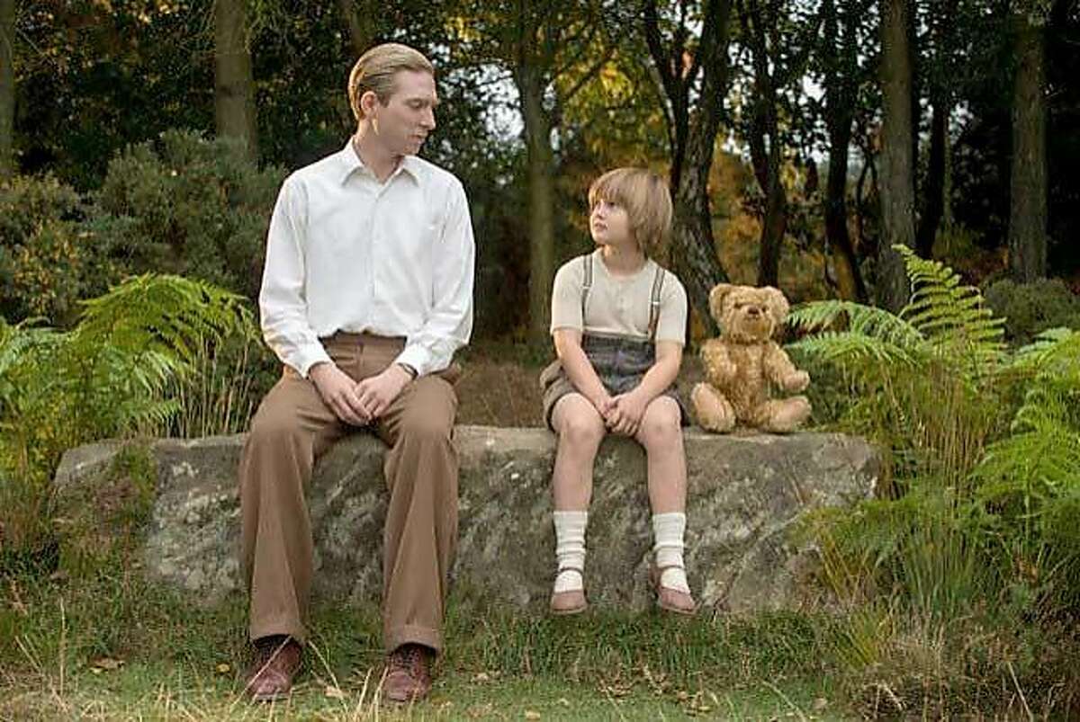 (L-r) Domhnall Gleeson and Will Tilston in "Goodbye Christopher Robin." MUST CREDIT: David Appleby, Fox Searchlight Pictures