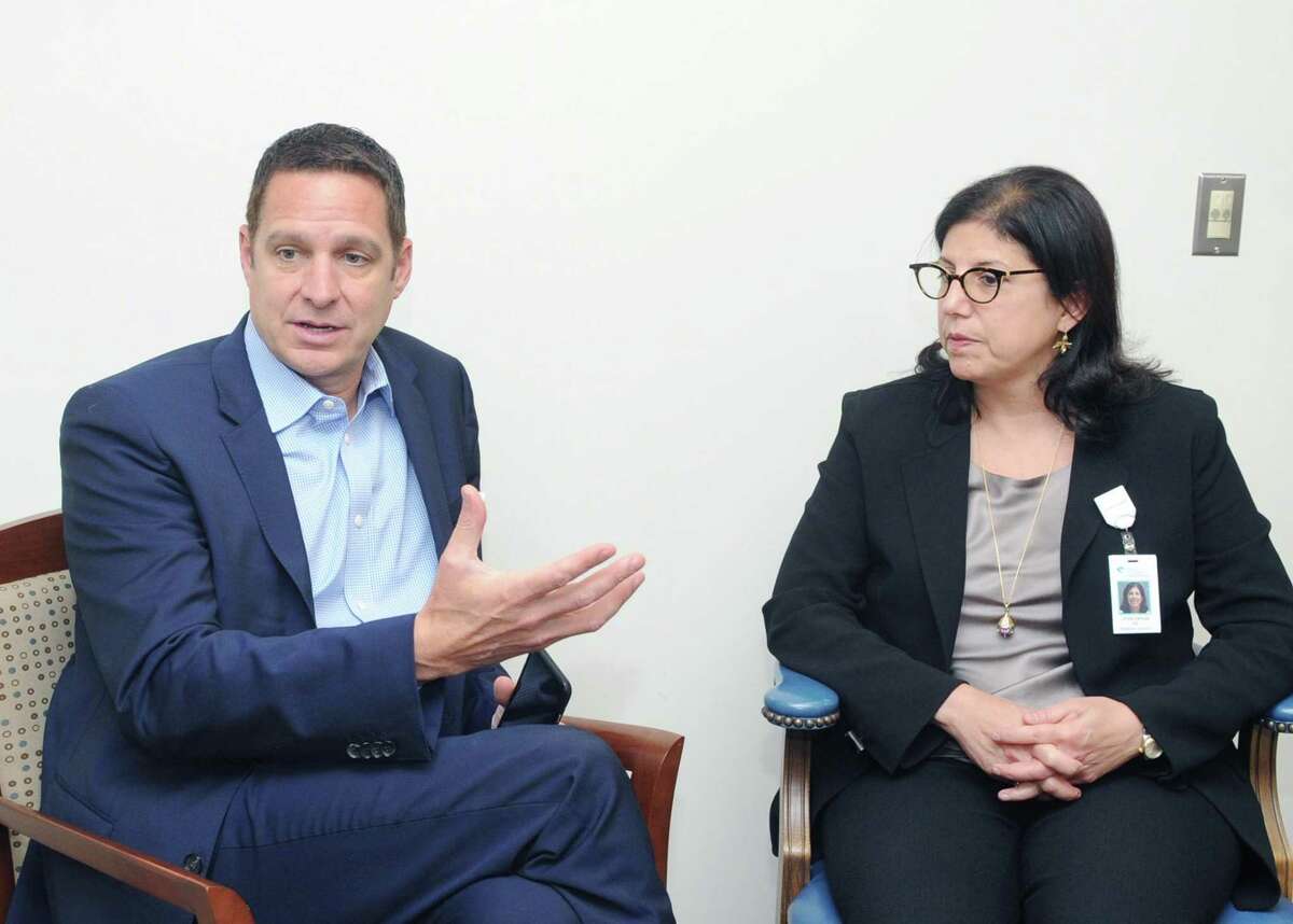 Michael Daglio, left, president of Norwalk Hospital and Memorial Sloan Kettering medical oncologist, Dr. Linda Vahdat, Norwalk Hospital's new Chief of Medical Oncology, speak about the new cancer care collaboration between Norwalk Hospital and Memorial Sloan Kettering Cancer Center at Norwalk Hospital, Conn., Friday, Oct. 13, 2017.