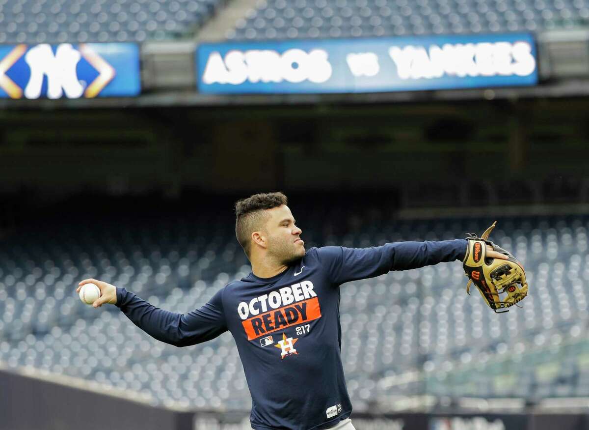 Houston Astros' Jose Altuve throws during a practice session at Yankee Stadium for Game 3 of the American League Championship Series baseball game against the New York Yankees Sunday, Oct. 15, 2017, in New York. (AP Photo/David J. Phillip)
