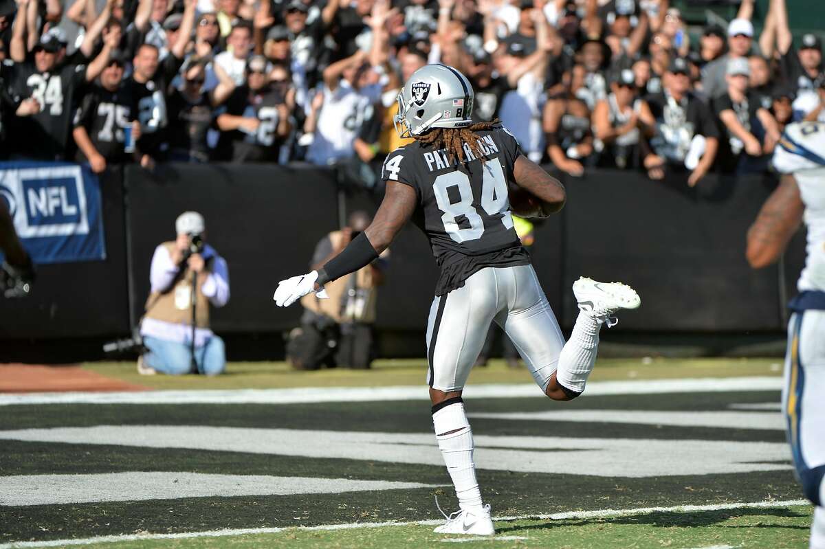 OAKLAND, CA - OCTOBER 15: Cordarrelle Patterson #84 of the Oakland Raiders scores on a 47-yard touchdown against the Los Angeles Chargers during their NFL game at Oakland-Alameda County Coliseum on October 15, 2017 in Oakland, California. (Photo by Don Feria/Getty Images)