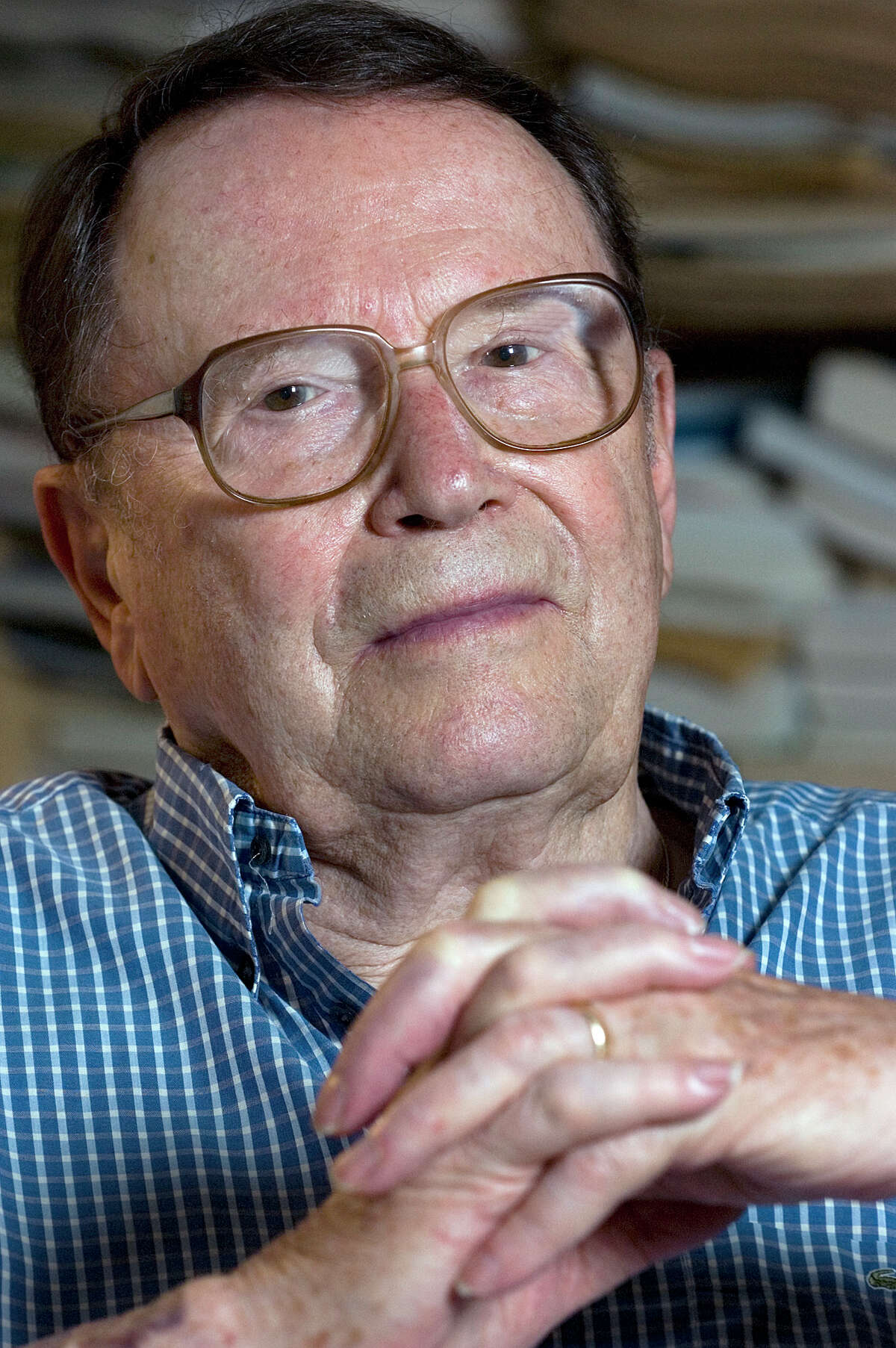 FILE- In this July 18, 2006, file photo, poet Richard Wilbur, a Pulitzer Prize winner and former poet laureate, poses for a photo at his home in Cummington, Mass. Wilbur, the Pulitzer Prize-winning poet and translator who intrigued and delighted generations of readers and theatergoers through his rhyming editions of Moliere and his own verse on memory, writing and nature, died. He was 96. Wilbur died Saturday, Oct. 14, 2017, night in Belmont, Mass., with his family by his side, according to friend and fellow poet, Dana Gioia. (AP Photo/Nancy Palmieri, File)