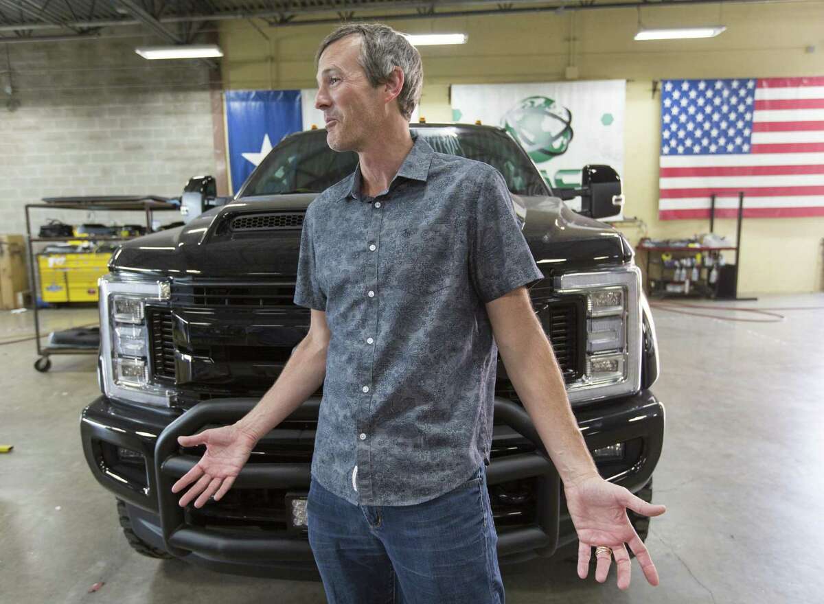 Trent Kimball, CEO and president of Texas Armoring Corp., talks in front of a Ford “Black Ops” truck at the company’s San Antonio facility in this 2017 photo. Texas Armoring retro-fits custom armoring products to production vehicles. They can provide anything from light hand gun protection all the way up to armor piercing rounds protection.