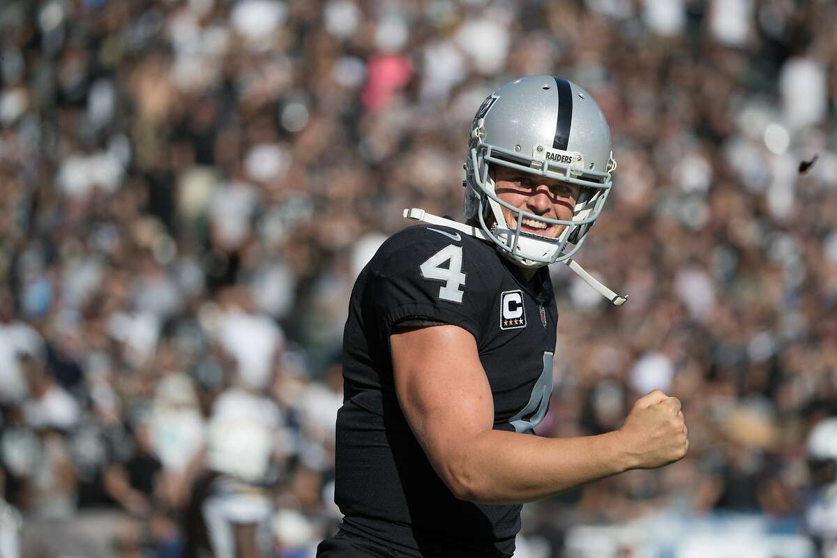 In this Sunday, Jan. 1, 2017, photo, Oakland Raiders quarterback