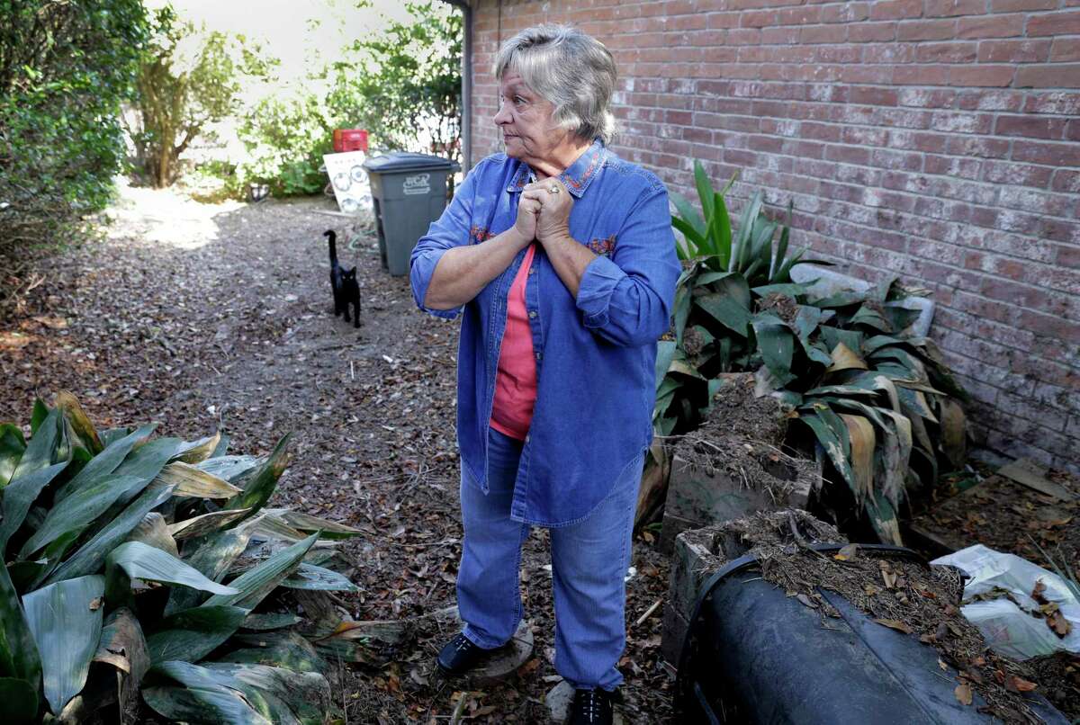 Mary Bessinger gets emotional as she talks about the flood damage from hurricane Harvey at her stripped down house as renovation continues at her home in Houston, TX, Oct. 11, 2017. (Michael Wyke / For the Chronicle)
