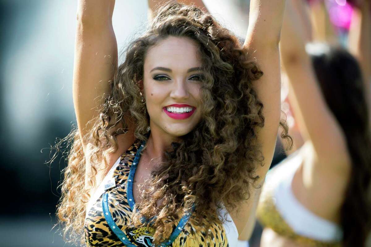 A against the Jacksonville Jaguars Roar cheerleader performs during the first half of an NFL football game against the Los Angeles Rams, Sunday, Oct. 15, 2017, in Jacksonville, Fla. (AP Photo/Stephen B. Morton)