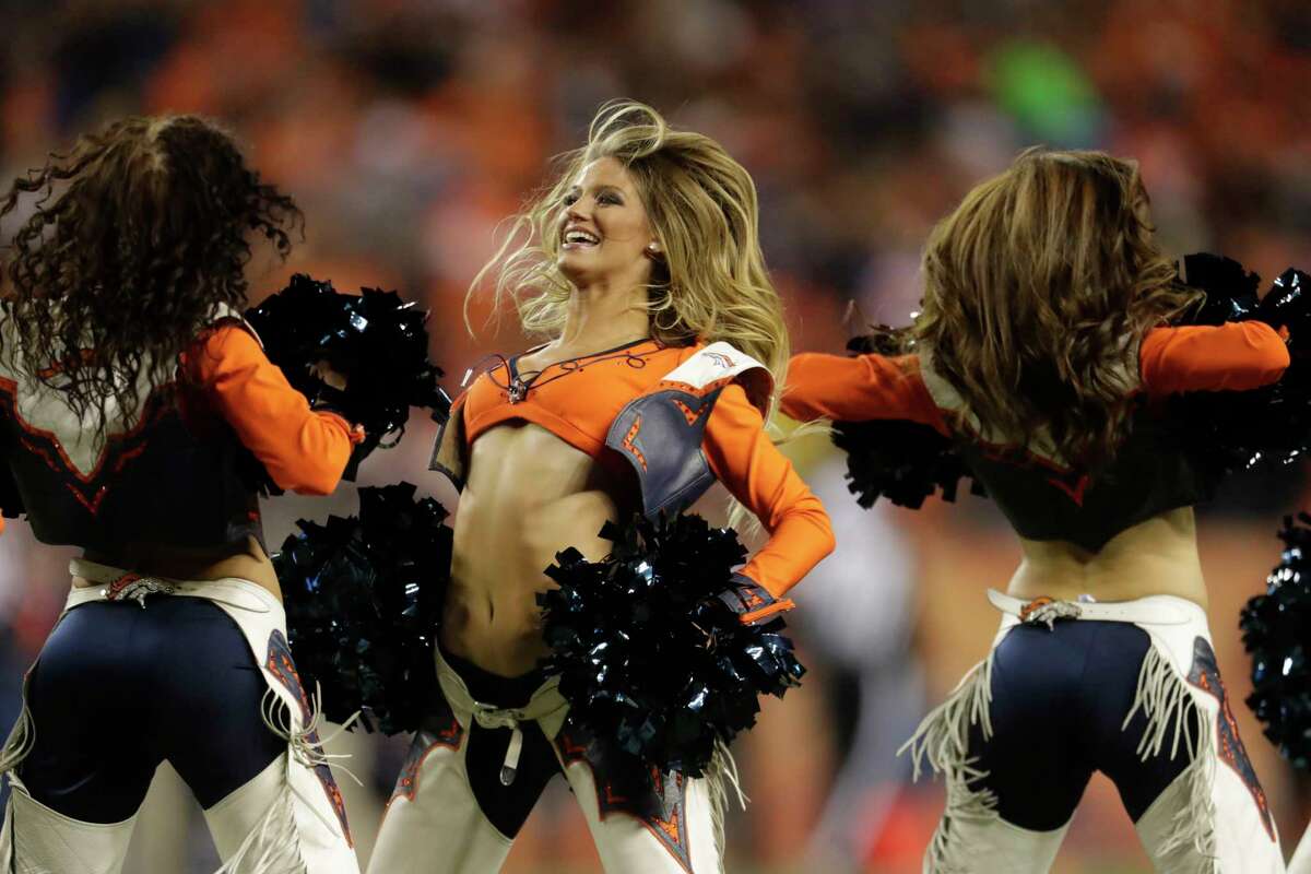 The Denver Broncos cheerleaders perform during the first half of