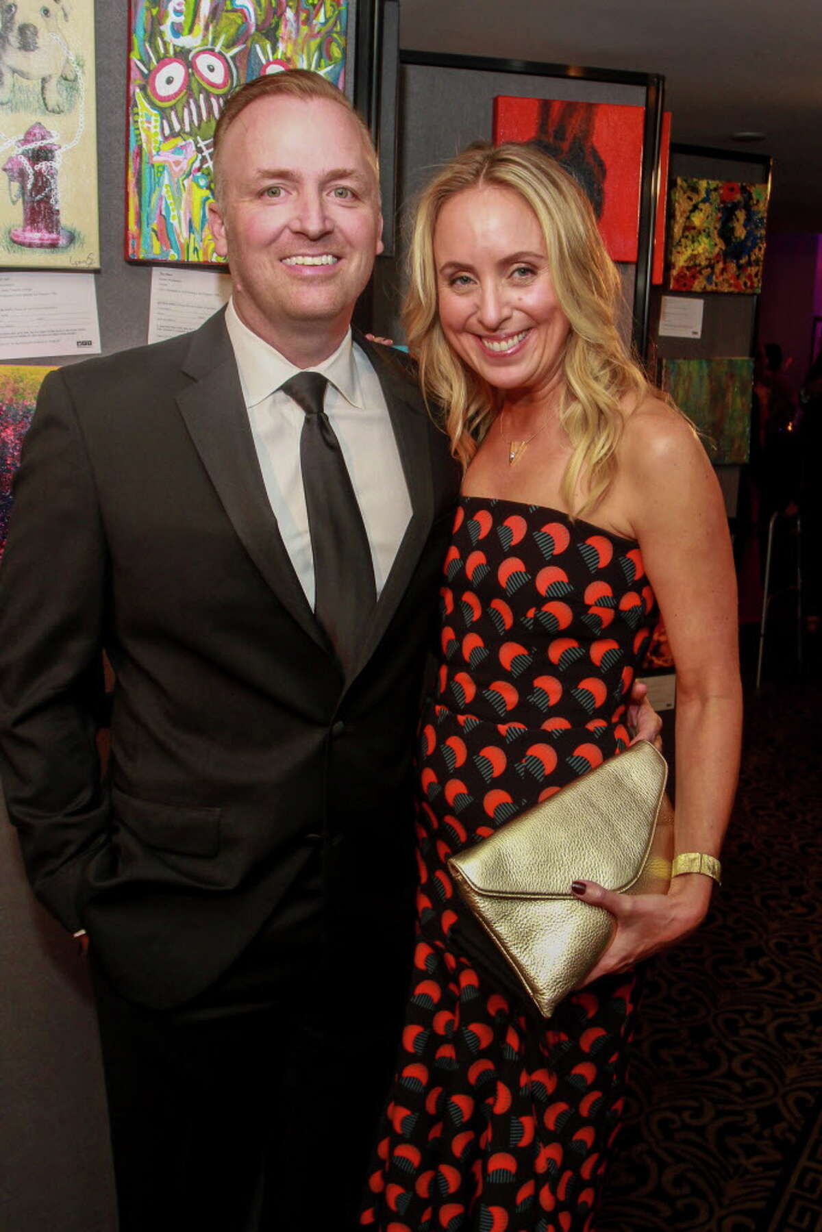 Art League Houston patrons toast Lynn Goode and Trenton