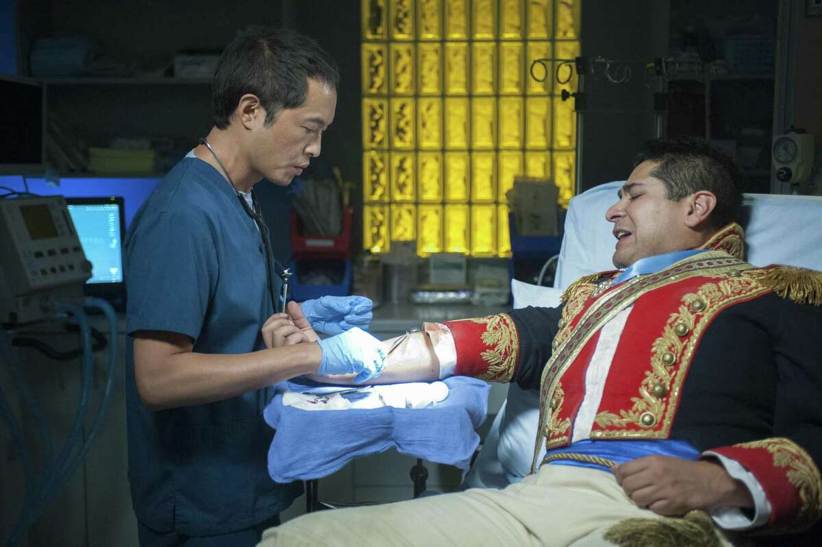 A Battle of the Alamo re-enactor gets treated on “The Night Shift”' during Season 2 of the NBC drama. Pictured: Ken Leung as Dr. Topher Zia.