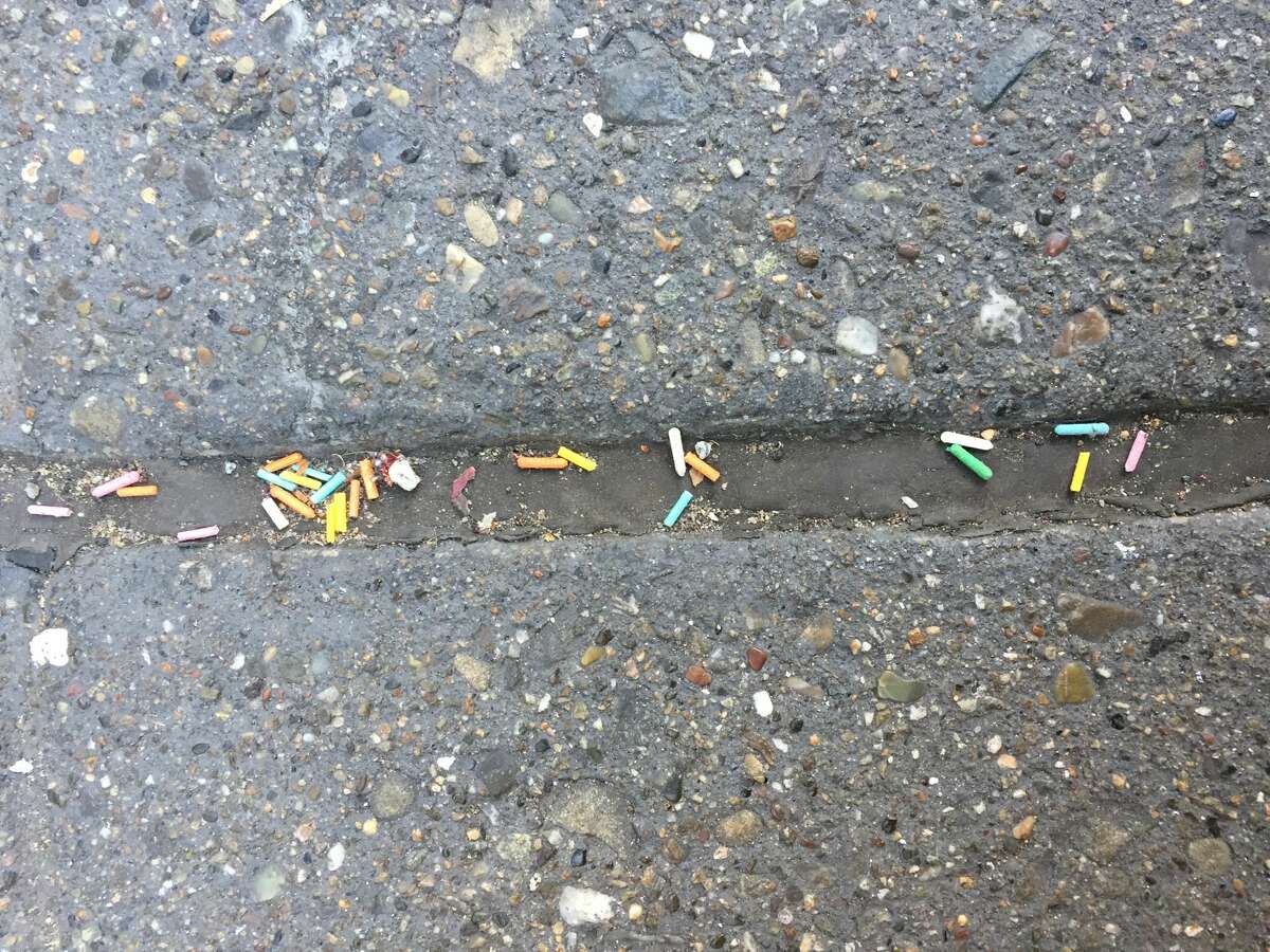 Plastic sprinkles can be seen on the sidewalks around the Museum of Ice Cream's San Francisco location. Environmentalists worry about the impact of the plastic washing into storm drains. 