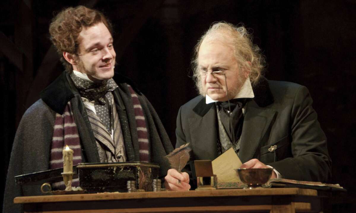 (L-R) Jay Sullivan as Fred and Jeffrey Bean as Ebenezer Scrooge in the Alley Theatre's "A Christmas Carol - A Ghost Story of Christmas." A Christmas Carol runs on the Alley's Hubbard Stage November 16 - December 24, 2012. Photo by Mike McCormick.