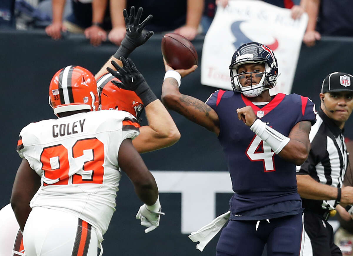 Houston Texans quarterback Deshaun Watson (4) throws a pass over Cleveland Browns defensive tackle Trevon Coley (93) during the second quarter of an NFL football game at NRG Stadium on Sunday, Oct. 15, 2017, in Houston. ( Brett Coomer / Houston Chronicle )