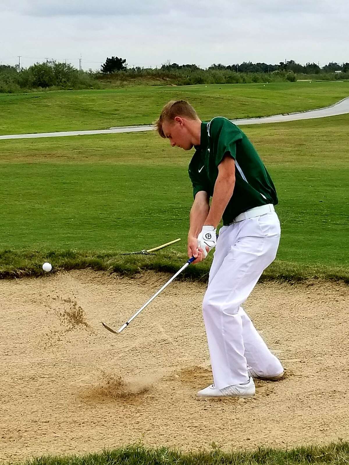 Midland College's Callum Bruce hits a bunker shot during the first round of the NJCAA Division I National Previews Tournament at The Rawls Course in Lubbock on Monday. Courtesy photo