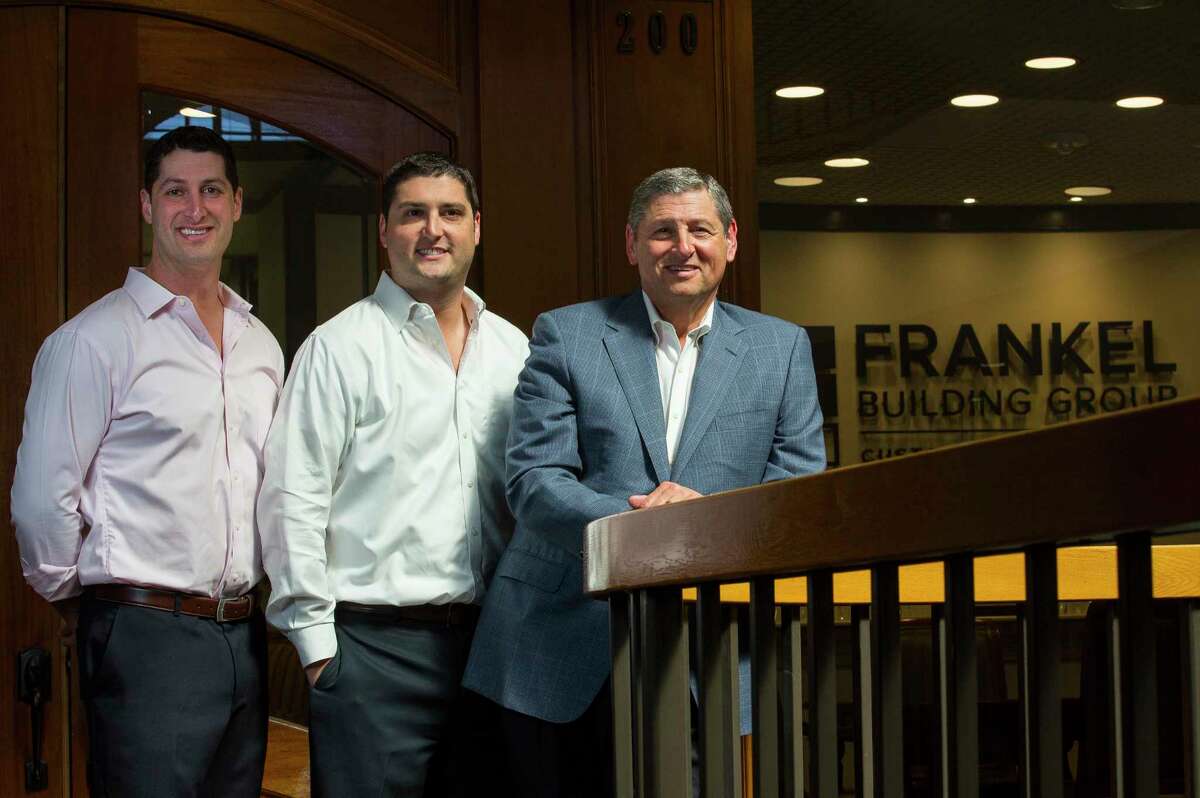 Brothers Kevin and Scott Frankel pose with their father Jim Frankel outside of their office on Tuesday, Oct.17, 2017, in Houston. (Annie Mulligan / Freelance)