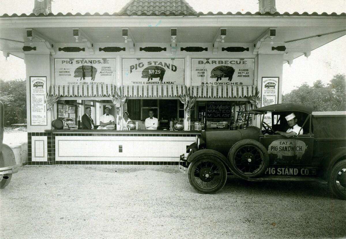 Shown here in 1931, the Pig Stand on Broadway is the last one surviving of a chain that once exceeded 130 locations and stretched from coast to coast. A bankruptcy filing in 2005 led to the closure of five other Pig Stand restaurants in Texas.