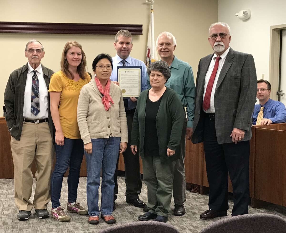 Members of the Baha'i community in Edwardsville were present at Tuesday's City Council meeting as Edwardsville Mayor Hal Patton awarded a proclamation, commemorating the 200th anniversary of the Baha'i faith's founder.