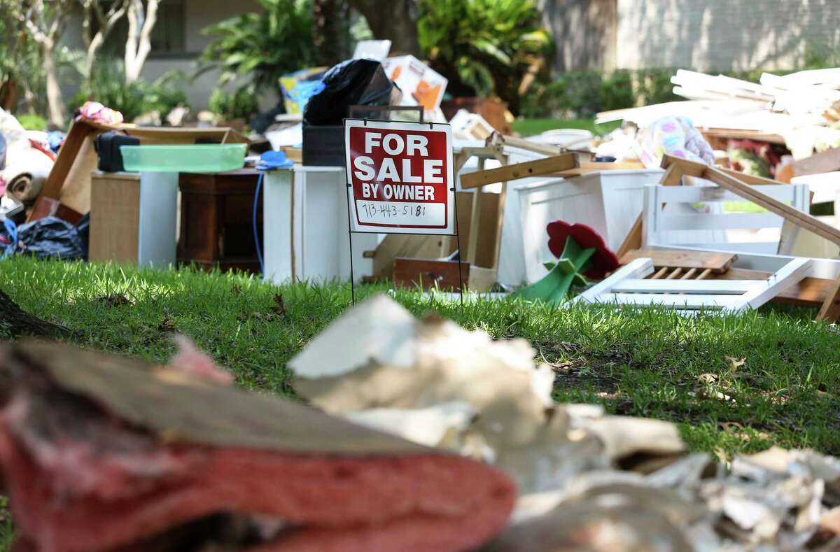 A "For Sale" sign went up last month in front of a flood-damaged home in Meyerland, one of thousands in the Brays Bayou watershed damaged by Harvey.