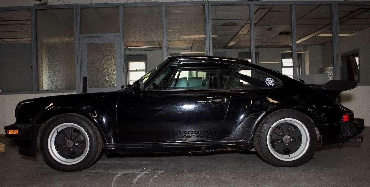 This 1986 Porsche 911 Turbo Carrera seized by the state Department of Motor Vehicles will be auctioned off by the state on Nov. 8 at the Harriman State Office Campus in Albany, N.Y.