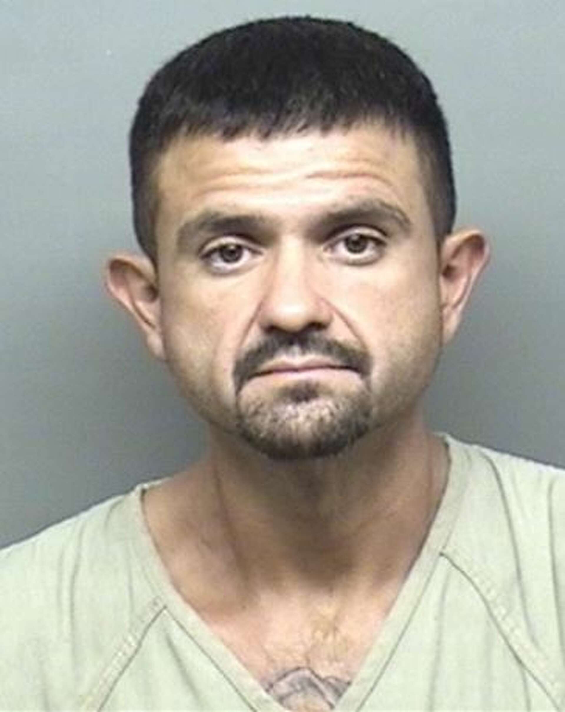 Police: Laredo man accused of holding immigrants hostage hid heroin, other  drugs inside rectum