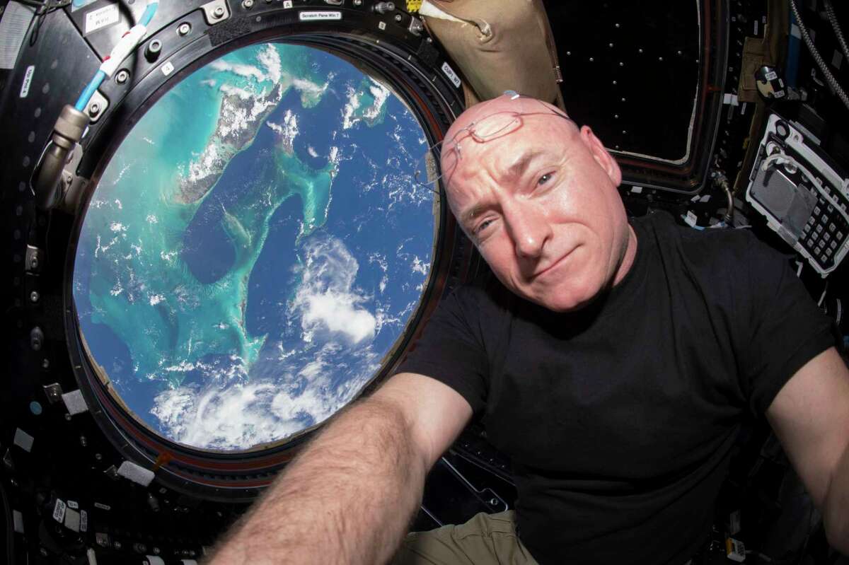 In this July 12, 2015 photo, AstronautÂ ScottÂ KellyÂ takes a photo of himself inside the Cupola, a special module of the International Space Station which provides a 360-degree viewing of the Earth and the station.